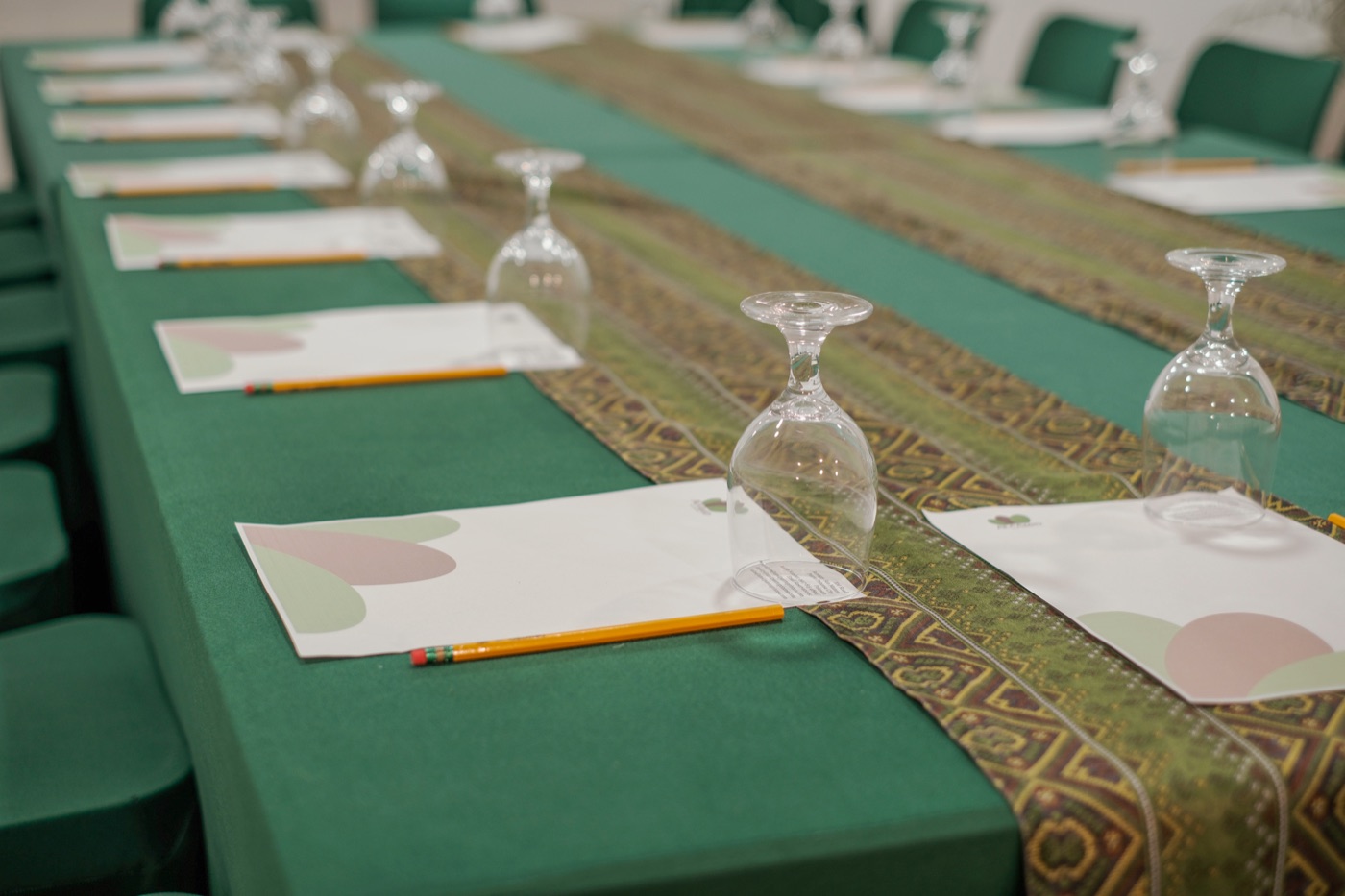 Place setting detail on the conference table in Isabel Function Room