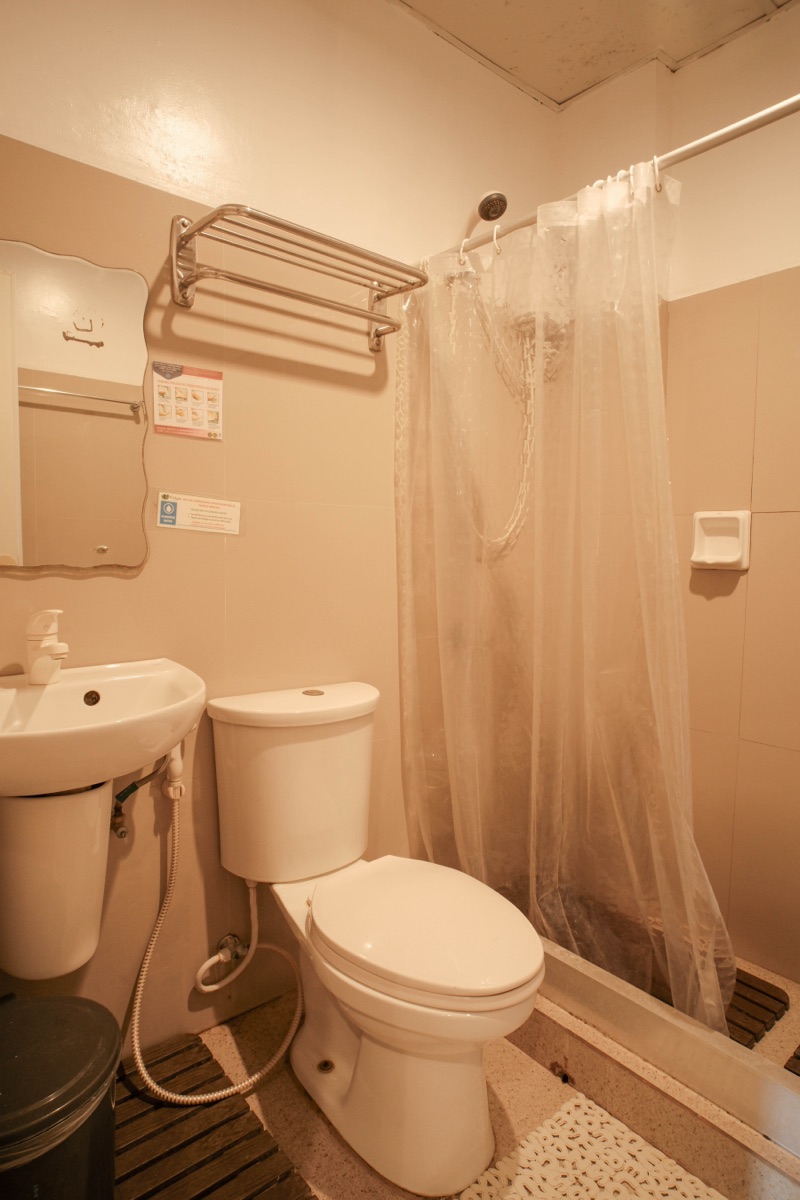 Deluxe Room bathroom with bidet and essential toiletries