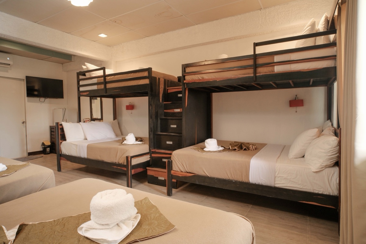 Bunk beds mounted above the full-size beds in the Family Suite
